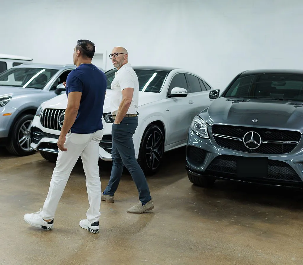 Eric Morgan touring an industrial showroom facility with a client
